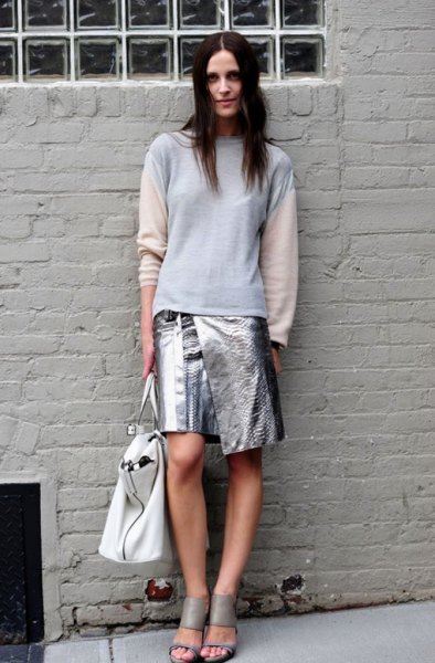 white and blue long-sleeved sweater made of metallic wrap-around skirt