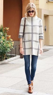 white and gray plaid tunic sweater with a mocked neck