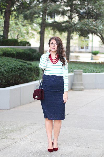 white-gray striped sweater with dark blue midi wrap skirt made of lace