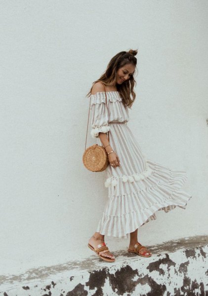 white and pale pink striped long dress with shoulder ruffles