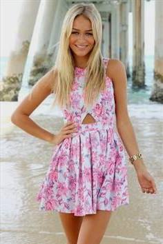 white and pink mini skater dress with a flower pattern on the front