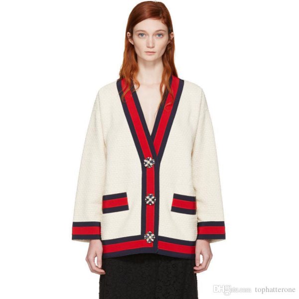 white and red knitted sweater with black midi skirt