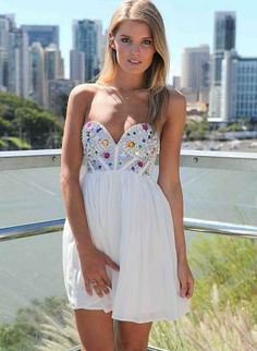 white and silver strapless mini dress with sequins embroidered with diamonds