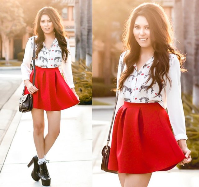 white blouse with animal motif and high-waisted red skater skirt