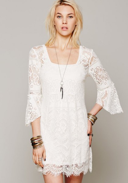 white lace shift dress with bell sleeves