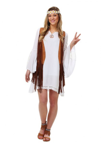 white shift dress with bell sleeves and black hippie vest