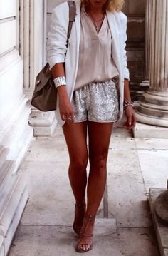 white blazer with a blushing pink blouse and shiny shorts