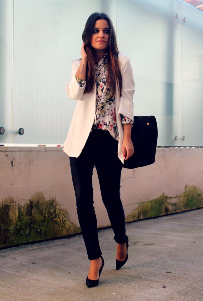 white blazer with printed silk blouse and black chinos