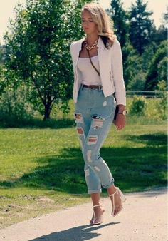 white blazer with a scoop neck top and light blue jeans