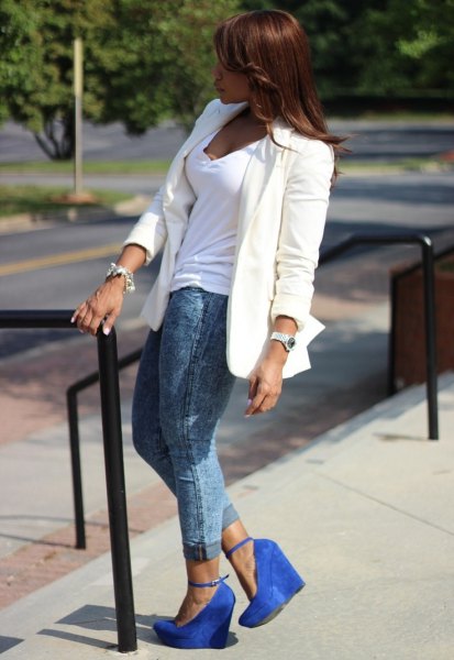 white blazer with V-neck and gray jeans