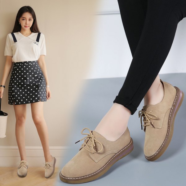 white blouse with black dotted mini skirt and light camel suede shoes