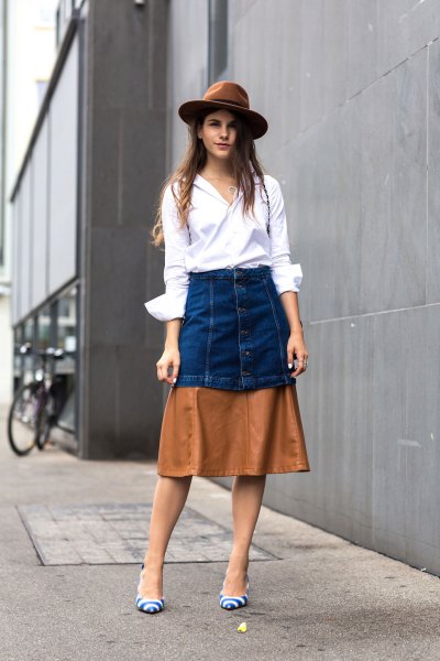 white button above shirt color black skirt felt hat