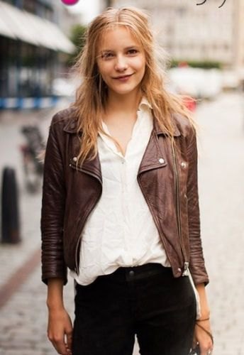 white shirt with buttons, brown jacket and black jeans with a slim fit
