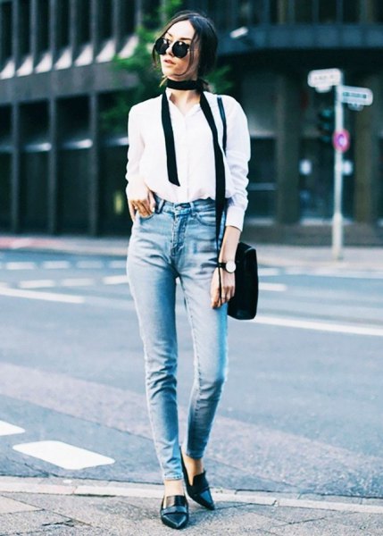 white shirt with buttons, slim fit jeans and black leather slippers with pointy toes