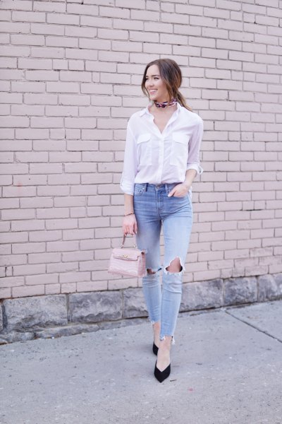 white shirt with buttons and light blue, ripped knee jeans