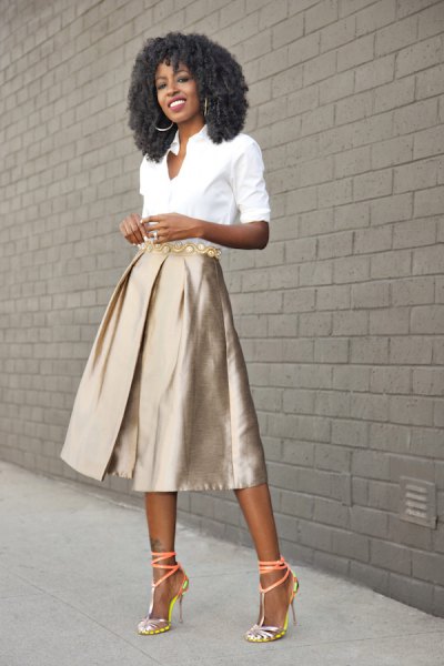 white shirt with buttons and rose gold colored midi skirt