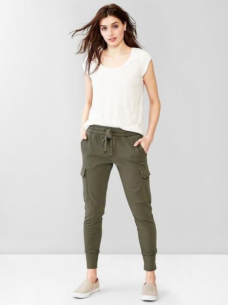 white t-shirt with cap sleeves and green khaki joggers