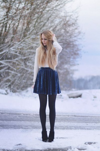 white chiffon blouse blue pleaded skirt