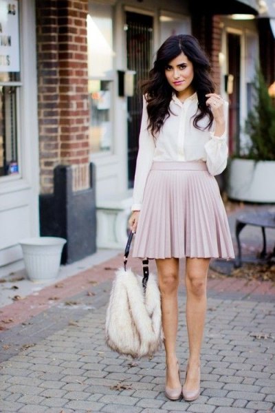 white chiffon shirt with buttons and light gray mini pleated skirt