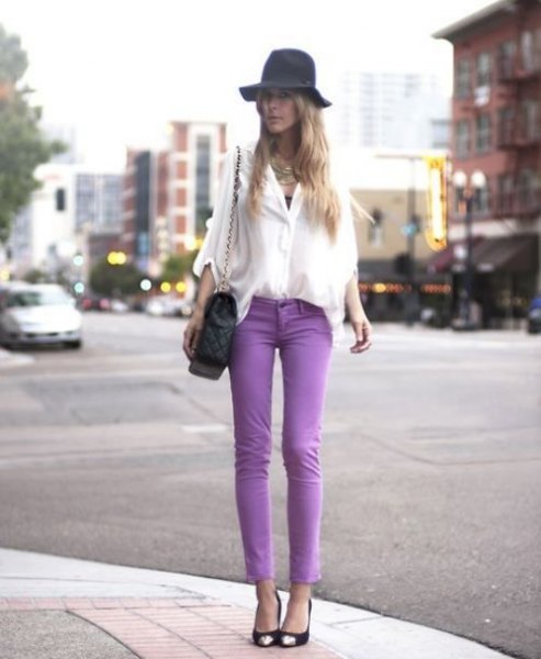 white chiffon blouse with wide sleeves, purple skinny jeans and floppy hat