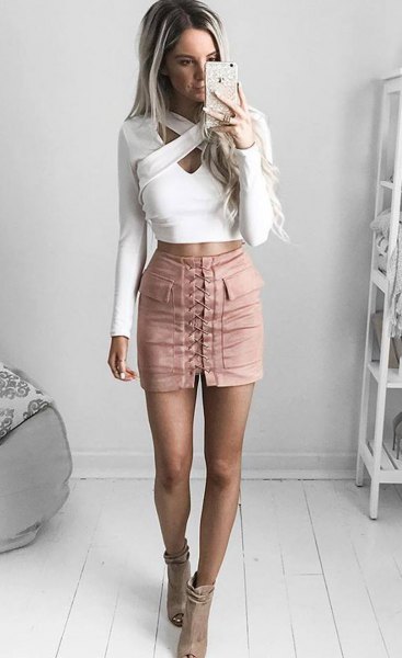 white criss cross front crop top pink lace-up mini skirt