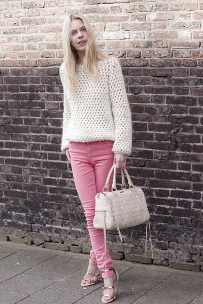 white crochet sweater with pink skinny jeans