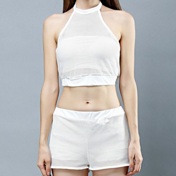 white, short halterneck top with mini mesh shorts