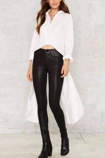 white, short cut, high, low blouse with black, high-waisted leather gaiters