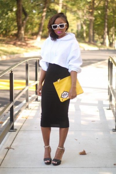 white cropped hoodie black high waisted midi skirt