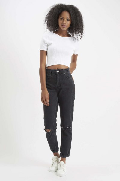 white short t-shirt with black ripped mother jeans