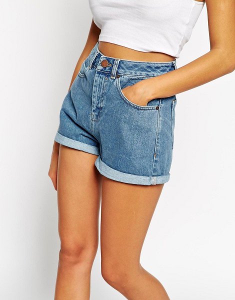 white short t-shirt with light blue mom jeans shorts with cuffs