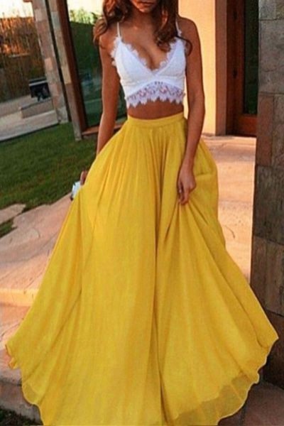 white top with deep V-neck and yellow, long, flowing chiffon skirt