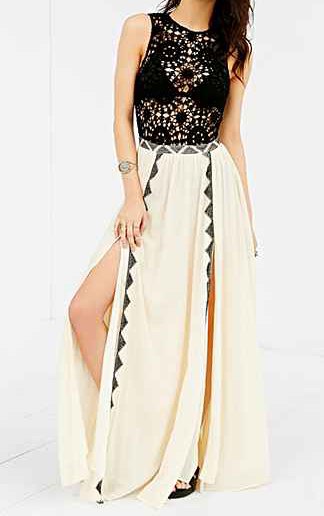 white, double-slit maxi skirt with sleeveless top made of black and silver sequins