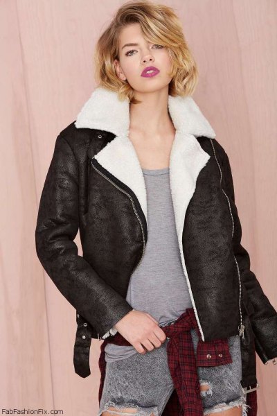 white faux fur collar black flight jacket with gray jeans