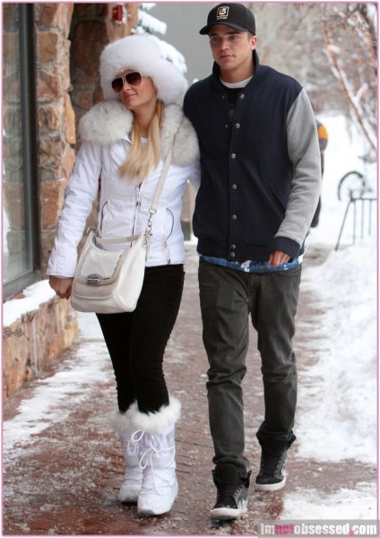 white faux fur collar coat with matching snowshoes