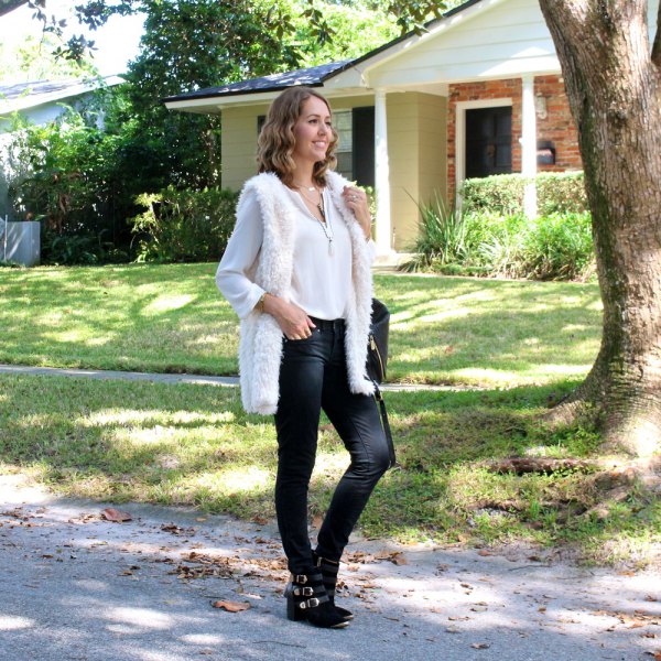 white fuzzy longline vest with chiffon blouse and skinny jeans