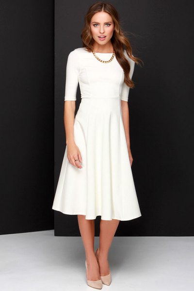 white half sleeve fit and flared midi dress with light pink heels