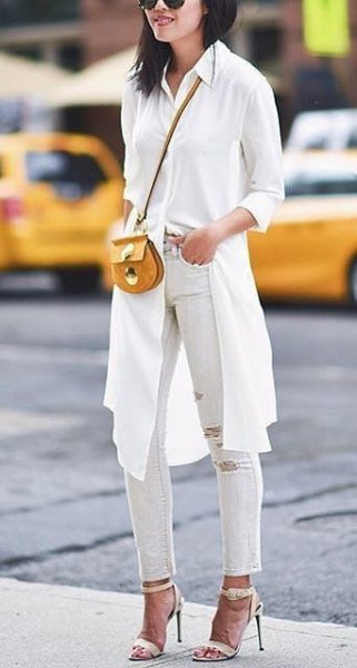 white knee-length longline blouse with ripped ankle jeans