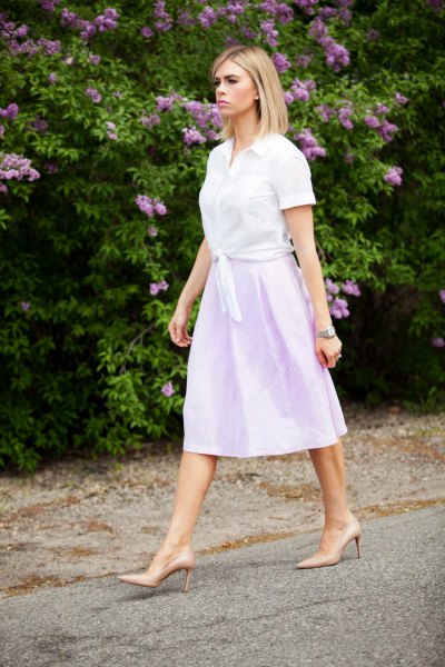 white knotted shirt with sky blue linen midi skirt