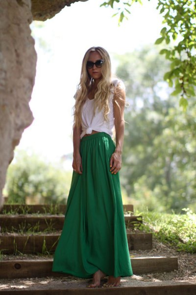 white knotted sleeveless T-shirt with green maxi skirt