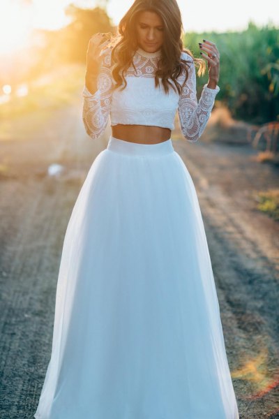 white lace cropped blouse with high waist long white tulle skirt