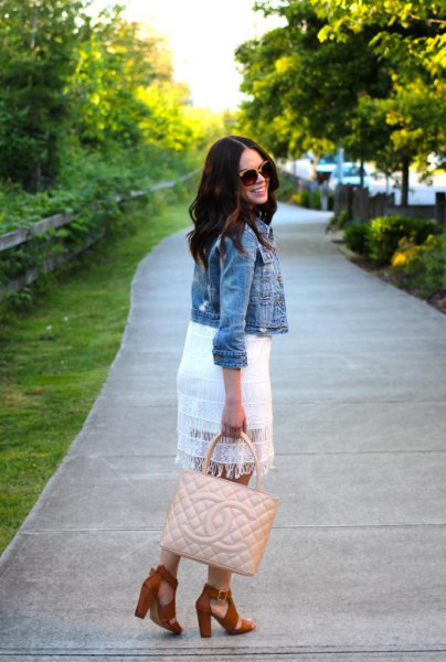white lace dress with a short denim jacket