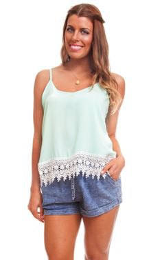 white lace top with blue mini denim shorts