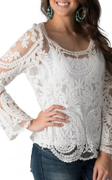 white lace long-sleeved top with jeans