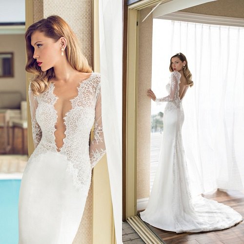 flowing wedding dress made of white lace with a deep neckline