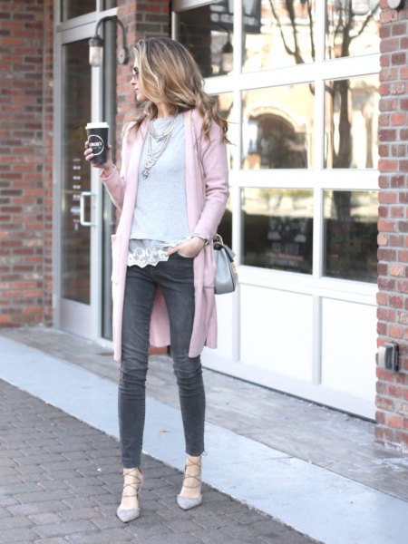 white lace blouse with scalloped hem and gray sweater