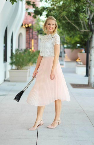 white lace short-sleeved blouse with a light yellow pleated skirt