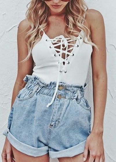 white spaghetti top with lacing and blue denim shorts with elastic waist