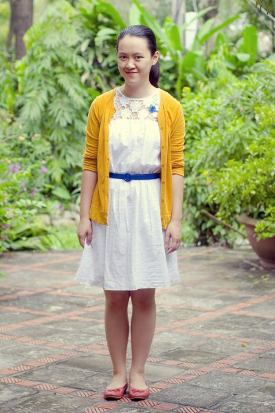 white shirt dress with linen belt and yellow cardigan