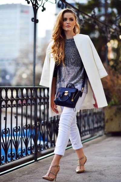 long white blazer with a silver top and bronze heels